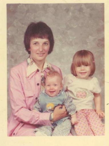 Judy holding Jenn, and Danielle Manzer